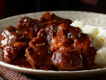 Slow braised beef tips recipe image